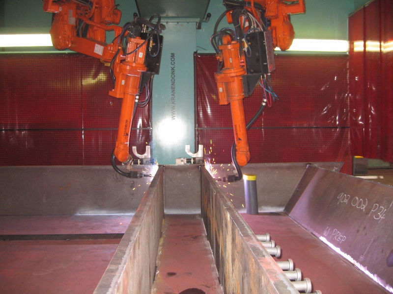 File:Robot welders in action.jpg